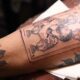 watch:-argentines-get-lionel-messi-tattoos-after-world-cup-win