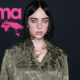 billie-eilish-poses-with-monsters-&-ghouls-at-halloween-horror-nights-after-tattoo-reveal