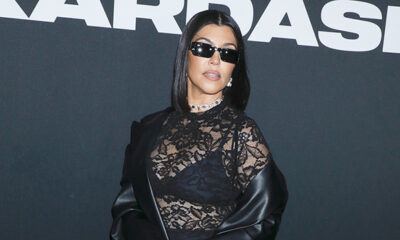 kourtney-kardashian-stuns-in-black-bodysuit-&-fur-coat-at-family-christmas-party-just-2-months-after-giving-birth