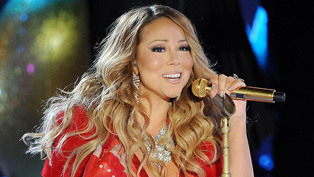 mariah-carey-steps-into-a-hot-tub-in-a-plunging-red-sequin-gown-to-ring-in-2024:-watch