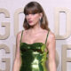 taylor-swift-rocks-sparkling-green-dress-on-the-golden-globes-red-carpet