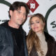 denise-richards-cuddles-up-to-husband-aaron-phypers-on-rare-date-night-at-sutton-stracke’s-western-party:-photos