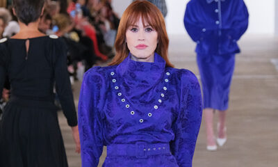 molly-ringwald-gives-‘80s-throwback-vibes-in-purple-dress-as-she-walks-the-runway-at-nyfw