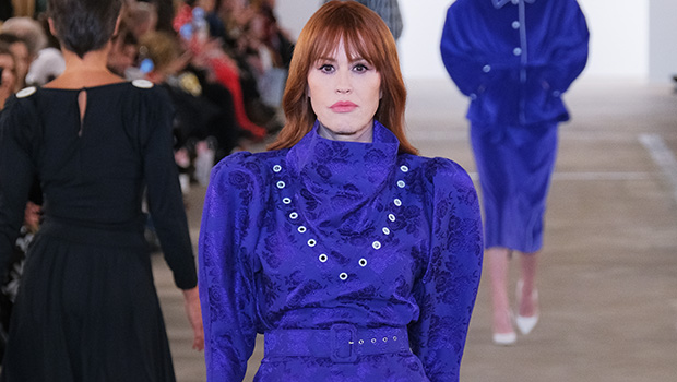 molly-ringwald-gives-‘80s-throwback-vibes-in-purple-dress-as-she-walks-the-runway-at-nyfw